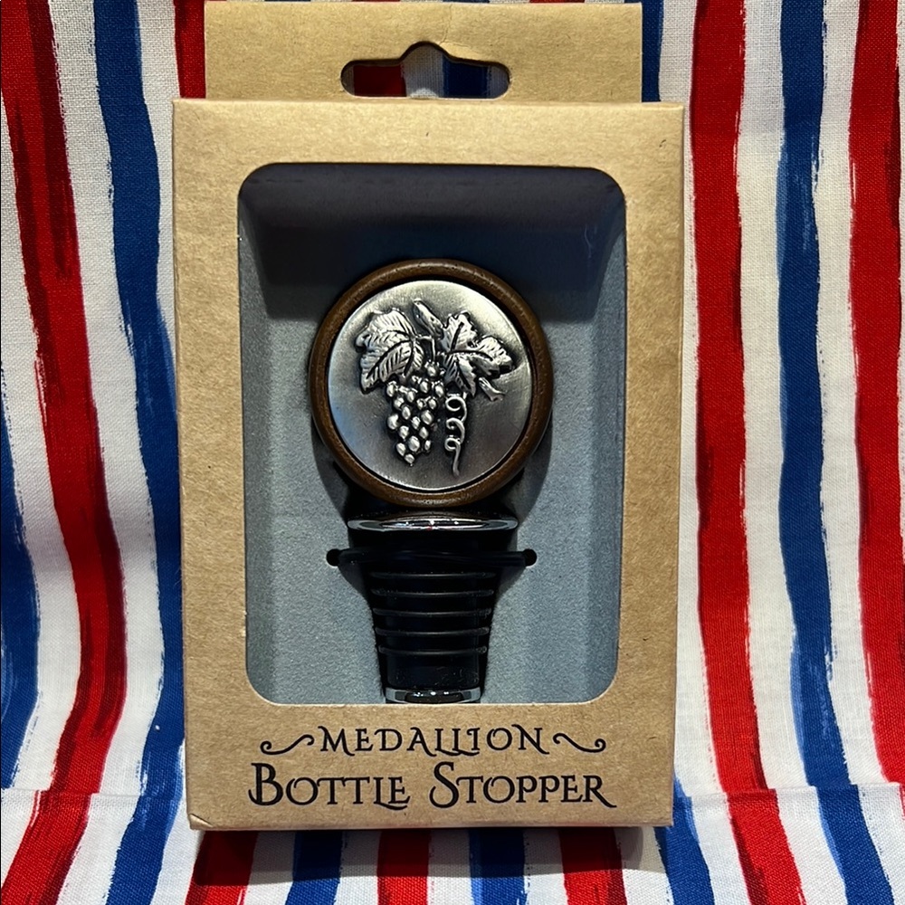 Medallion bottle stopper. Made by Prodyne